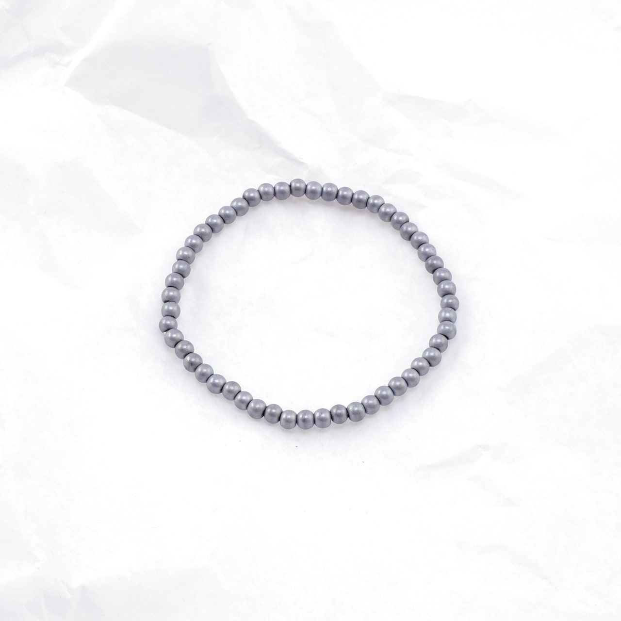 Armkette Glasperlen rund grau